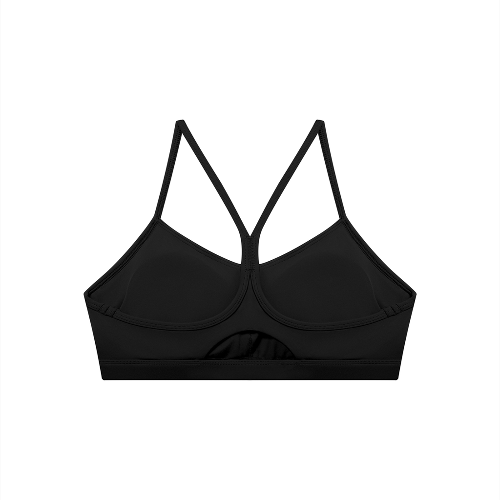Black bralette with thin straps on a white background
