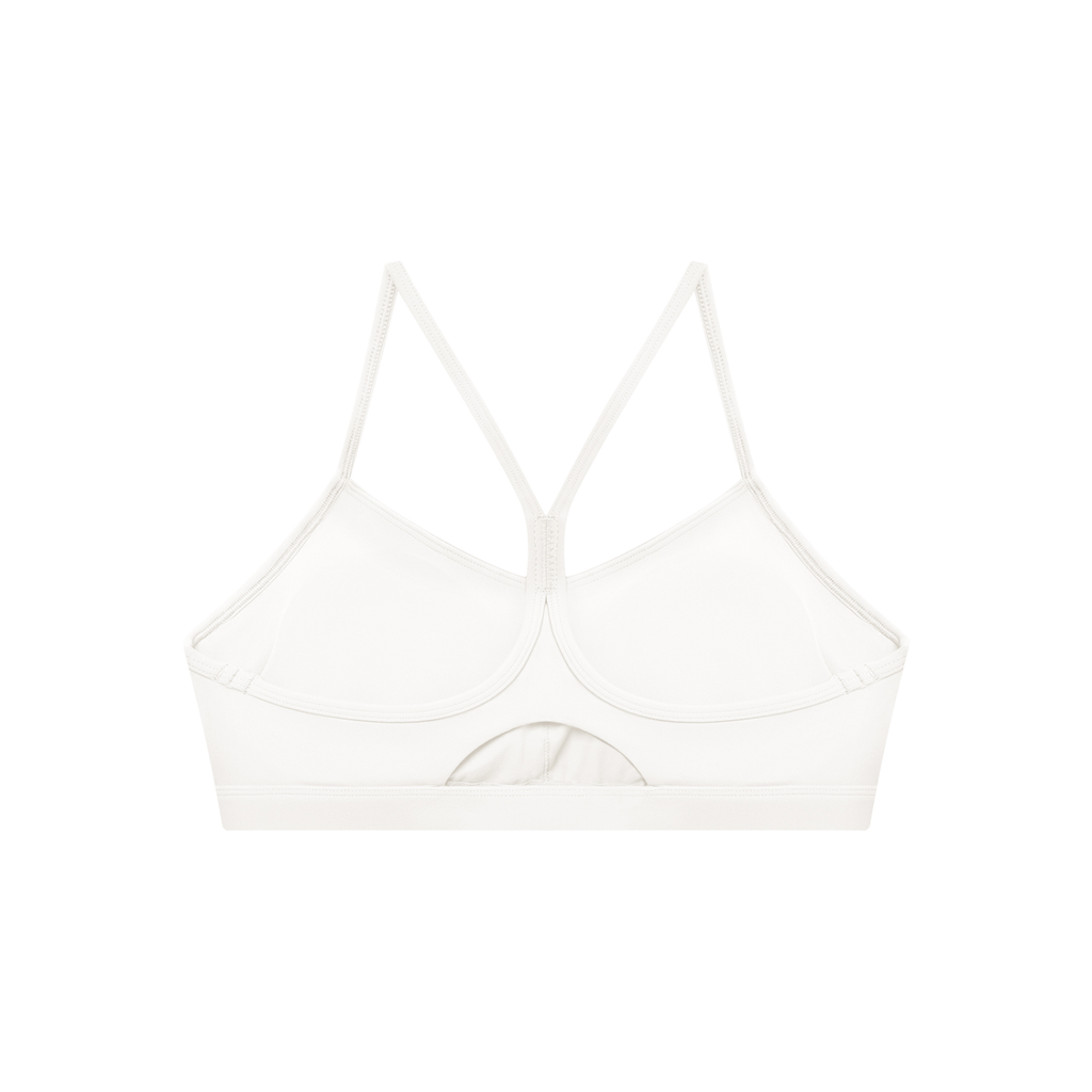 White bralette with thin straps on a white background