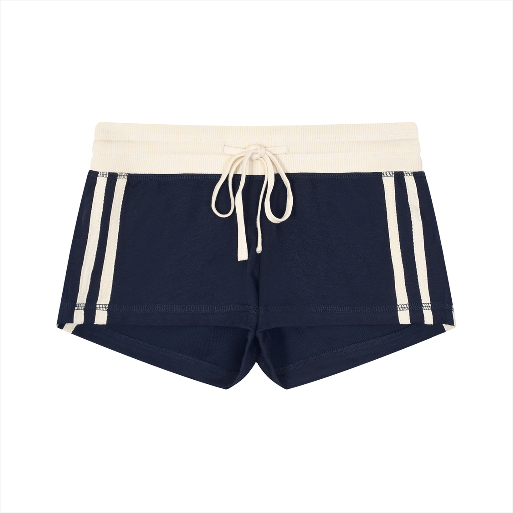 Navy shorts with white drawstring and trim on a white background