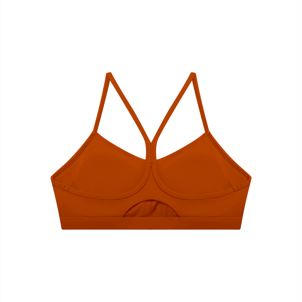 Brown bralette with thin straps on a white background