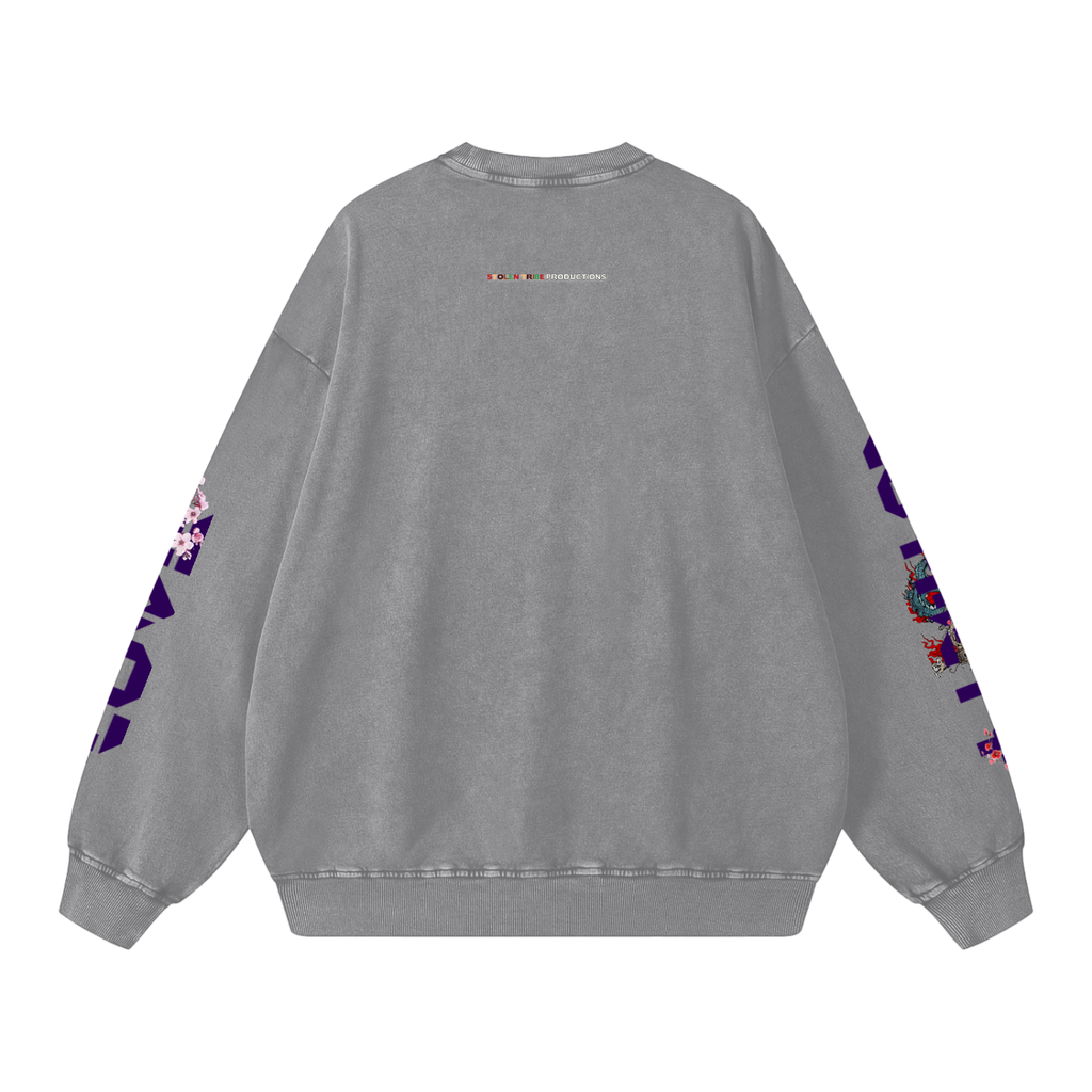 Gray sweatshirt with colorful designs on sleeves against a white background
