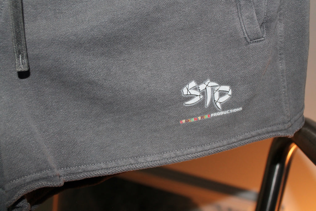 Gray sweatshirt with a logo on a chair