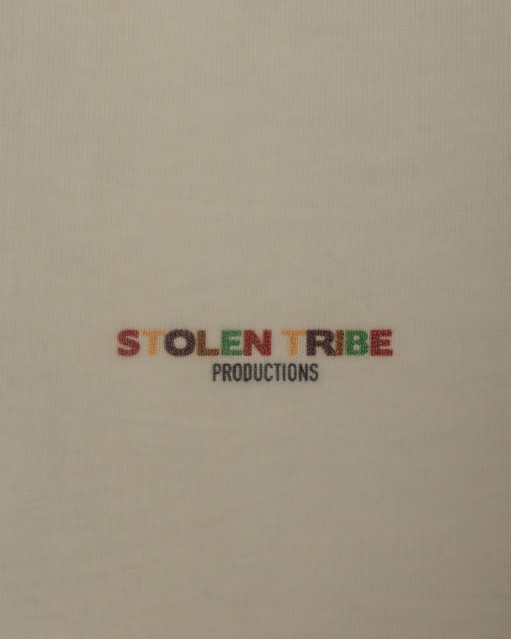 Text 'STOLEN TRIBE PRODUCTIONS' on a beige background