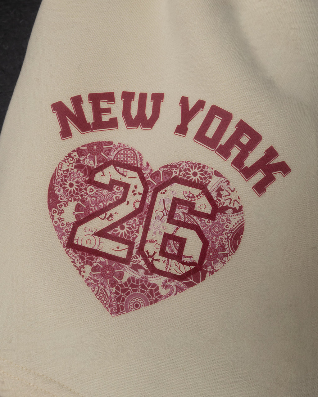 Beige bag with 'New York 26' printed in red with a heart design.