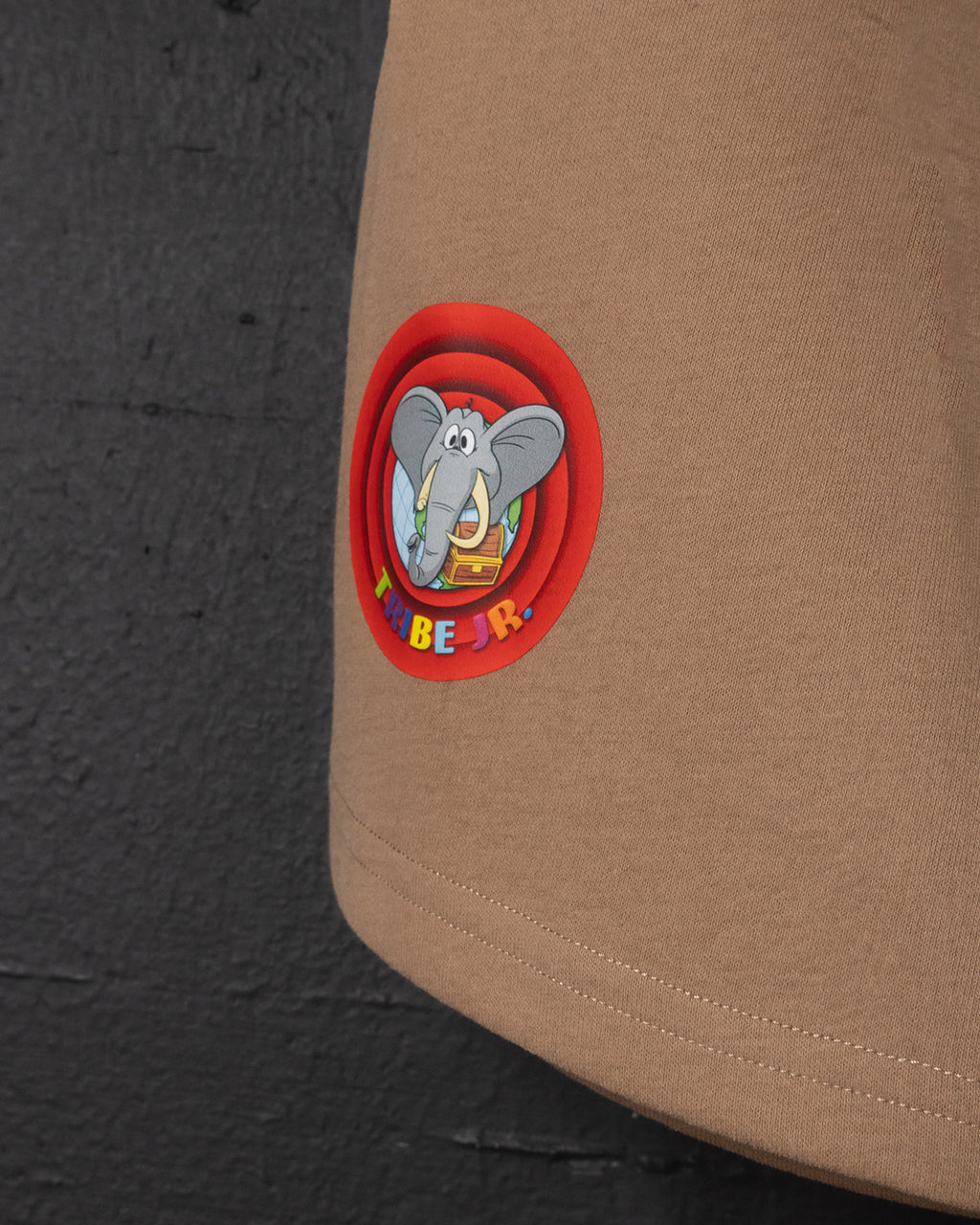 Patch with an elephant design on a brown surface
