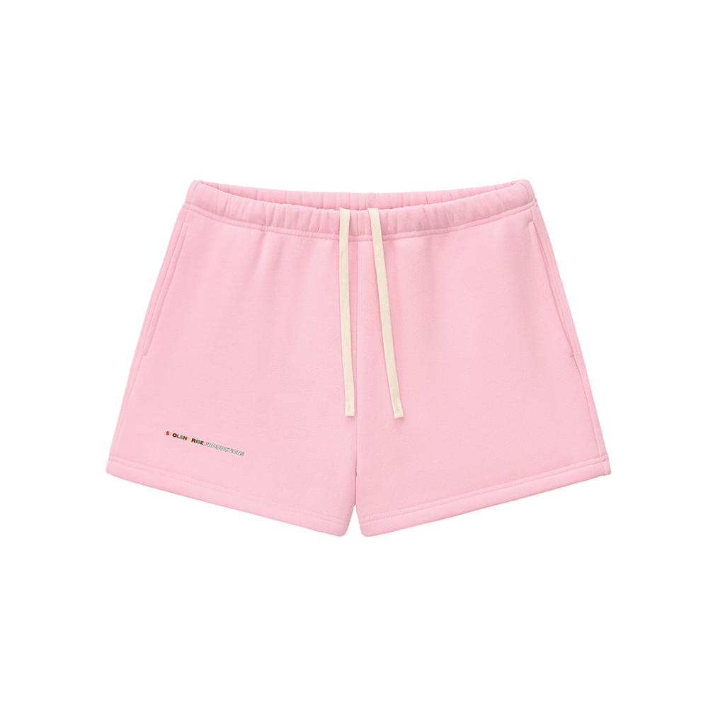 Pink shorts with a drawstring on a white background
