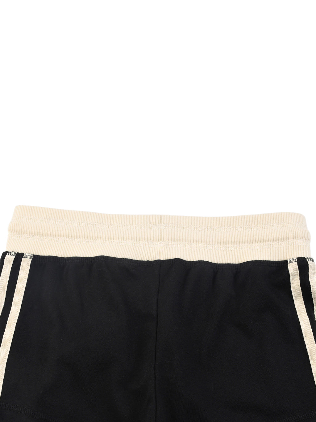 Black shorts with a cream waistband on a white background
