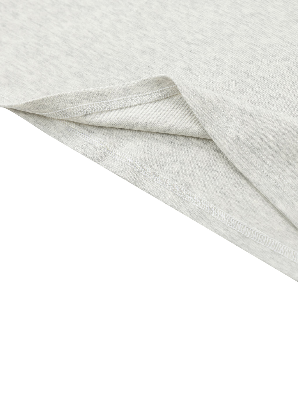 Close-up of light gray fabric with a subtle pattern on a white background