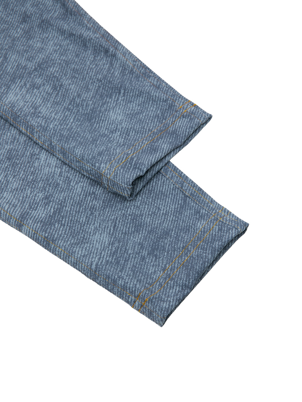 Folded denim fabric on a white background