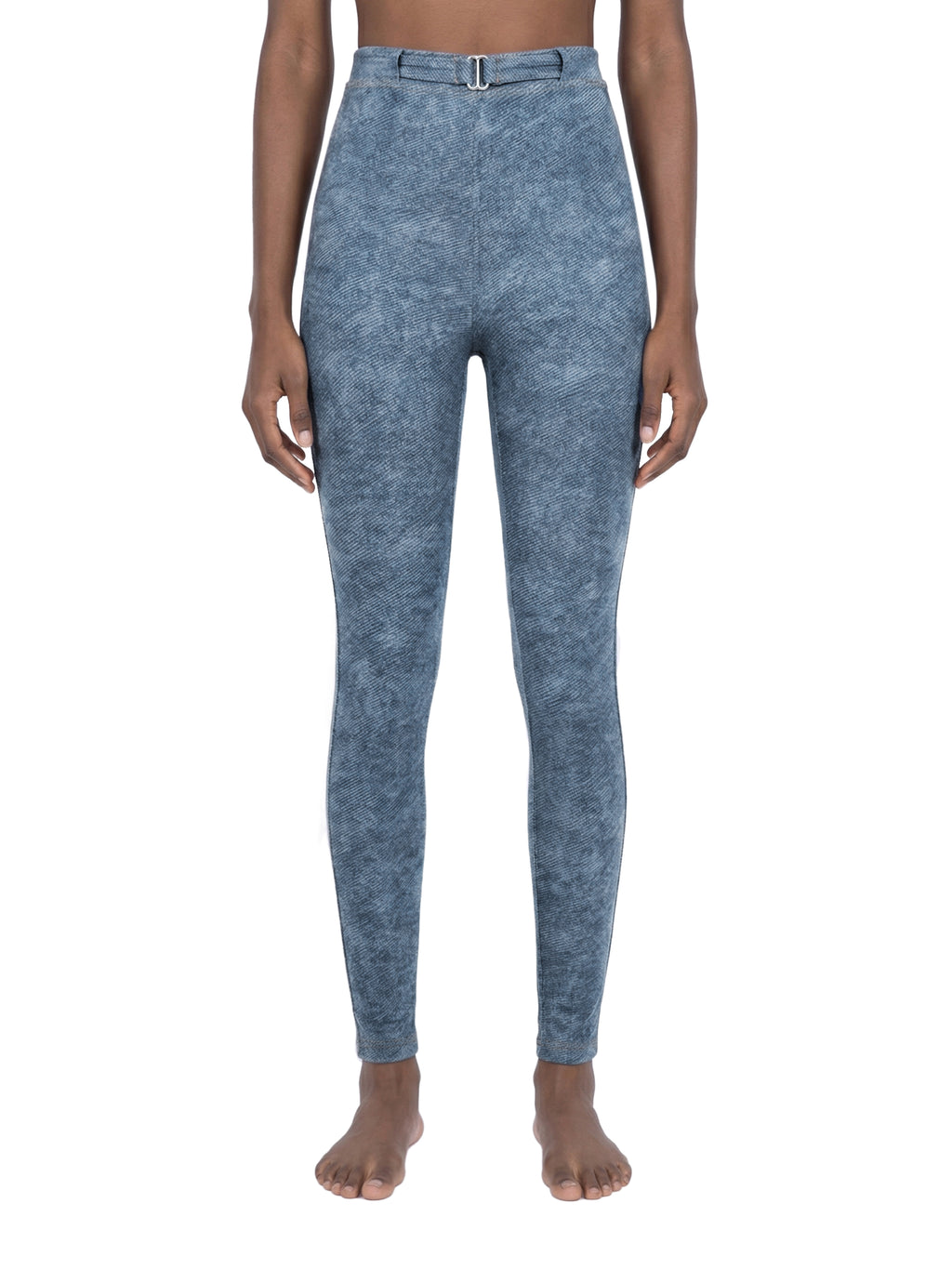 Blue acid-wash leggings worn by a person on a white background