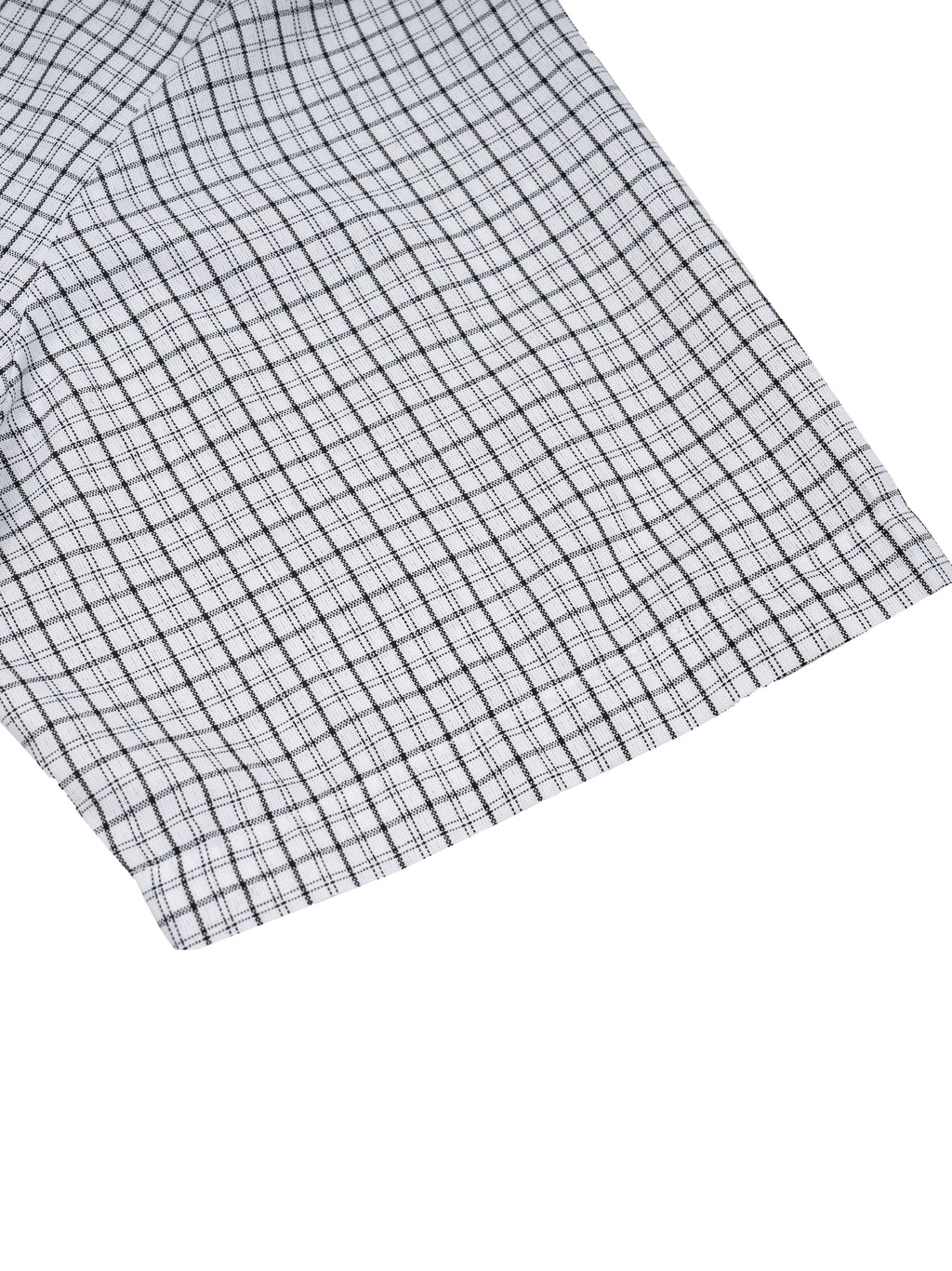 Close-up of a black and white checkered fabric on a white background