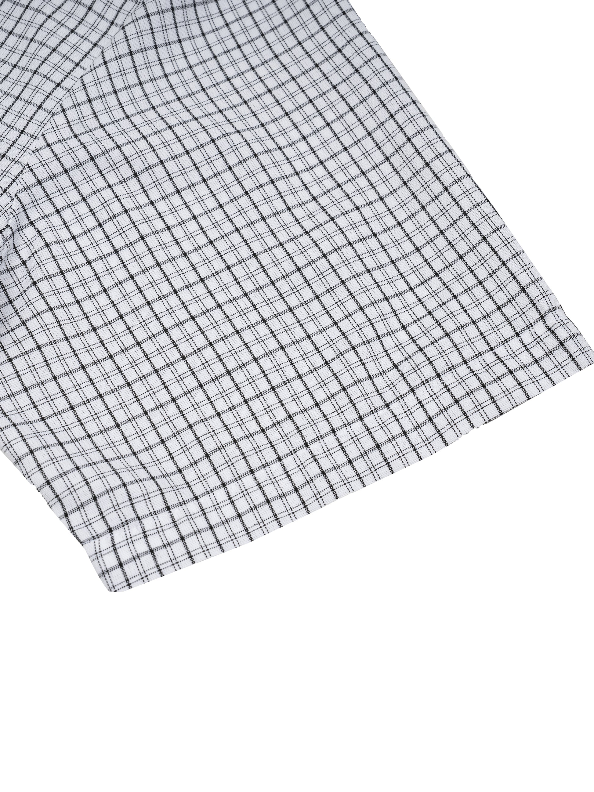 Close-up of a black and white checkered fabric on a white background