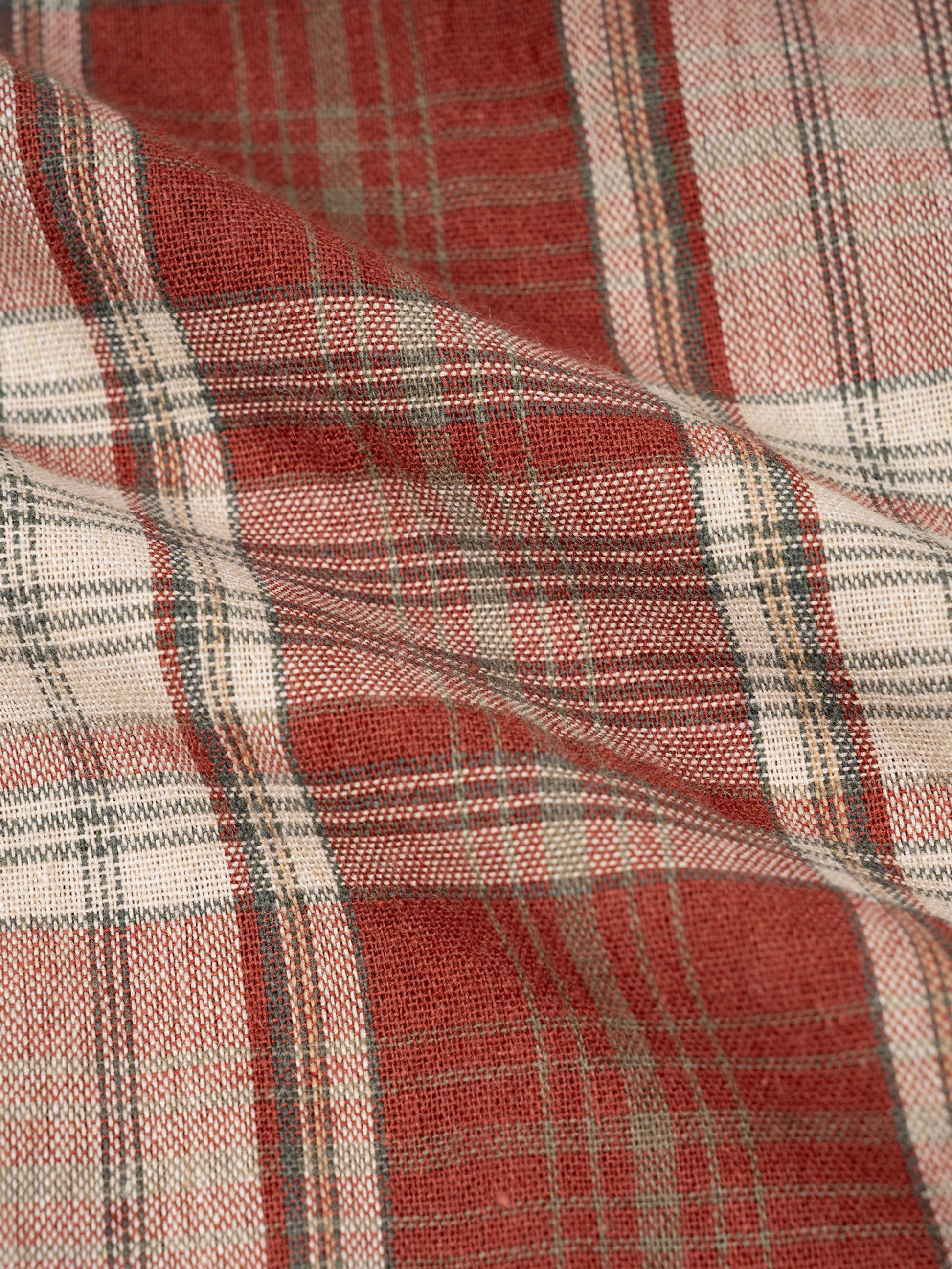Close-up of red and beige plaid fabric