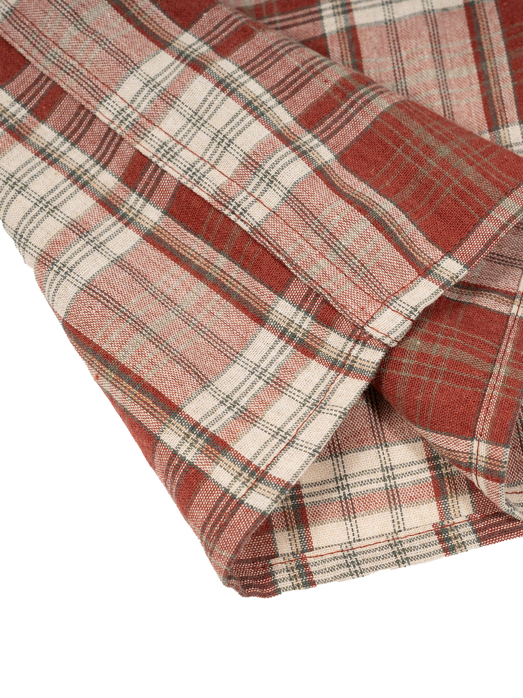 Red and beige plaid fabric on a white background