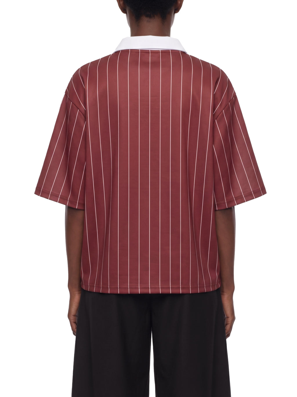 Person wearing a maroon pinstripe shirt on a white background