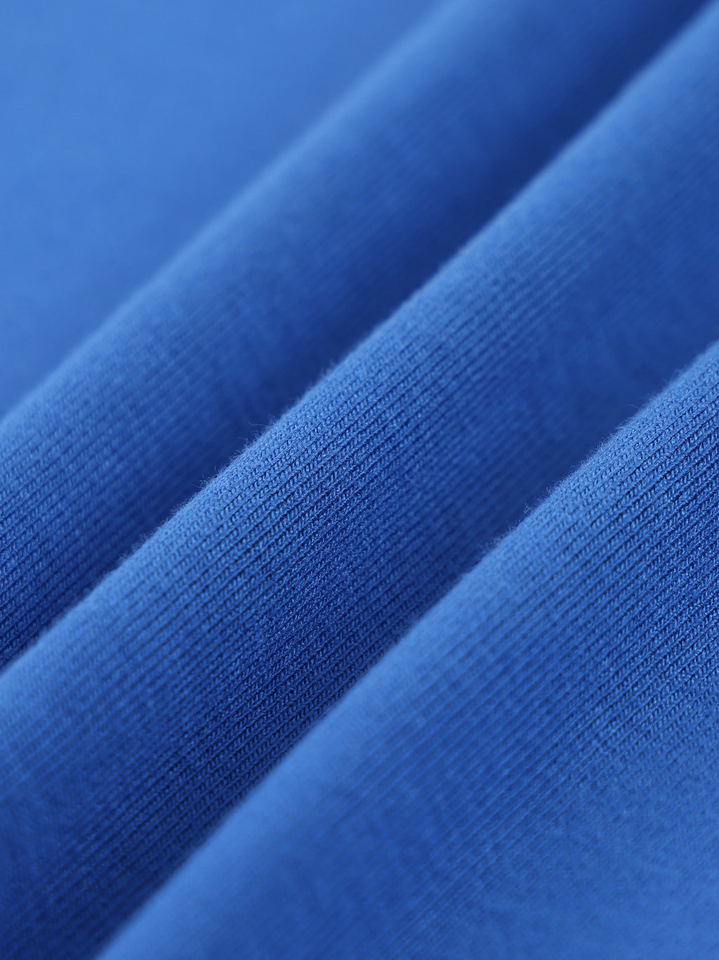 Close-up of blue fabric with a textured pattern