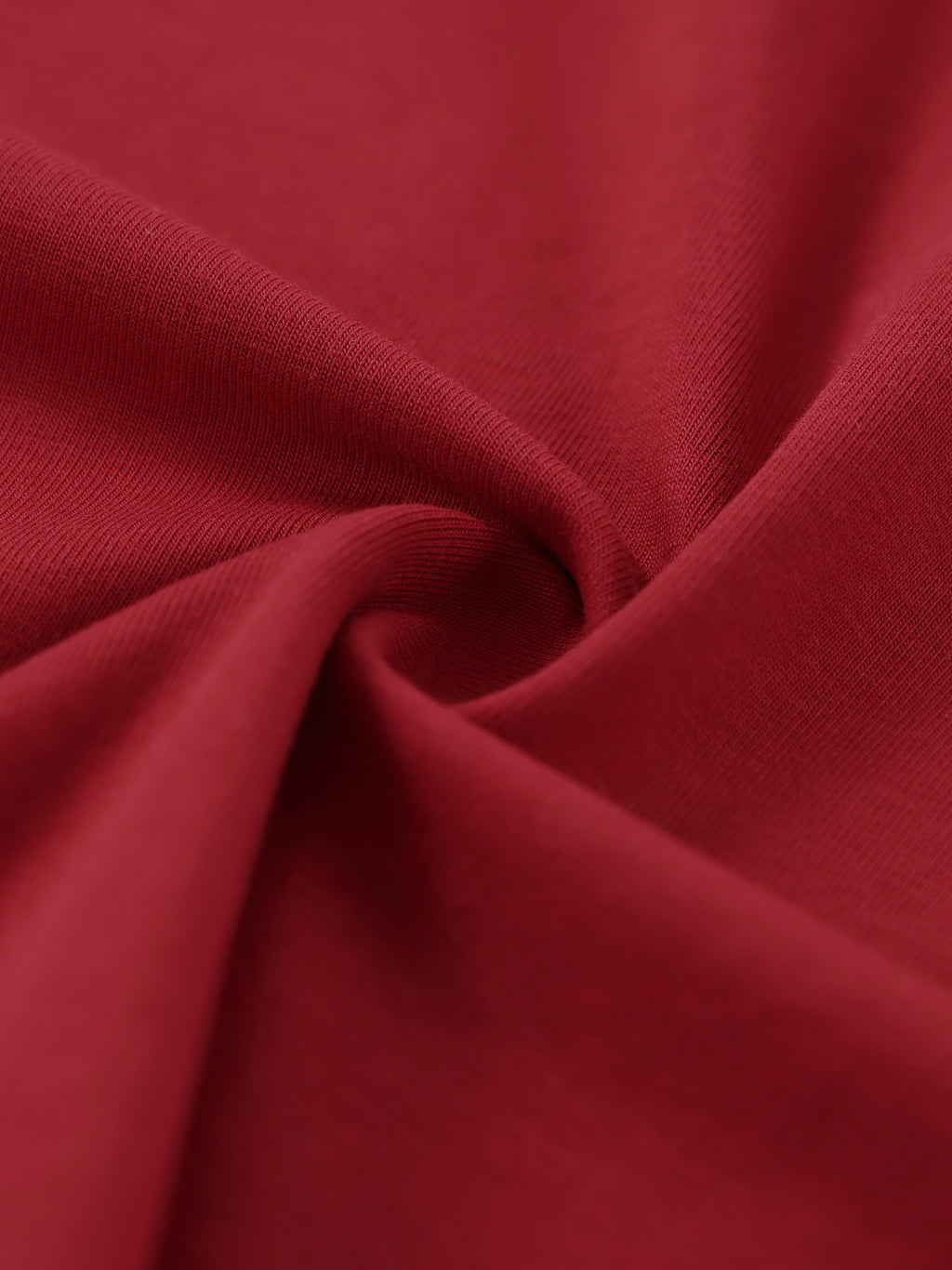 Close-up of red fabric with folds