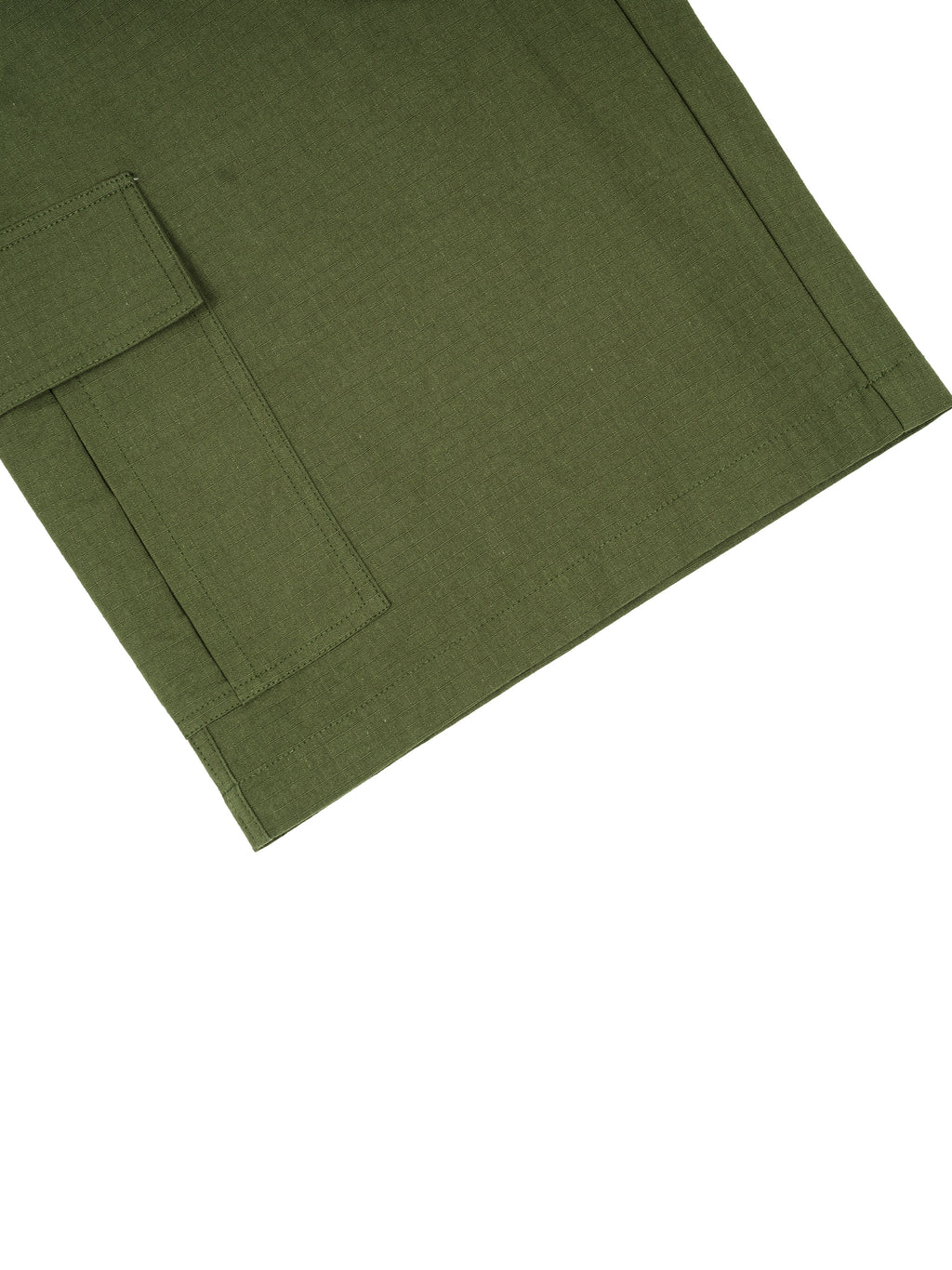 Close-up of a green fabric with a pocket detail on a white background