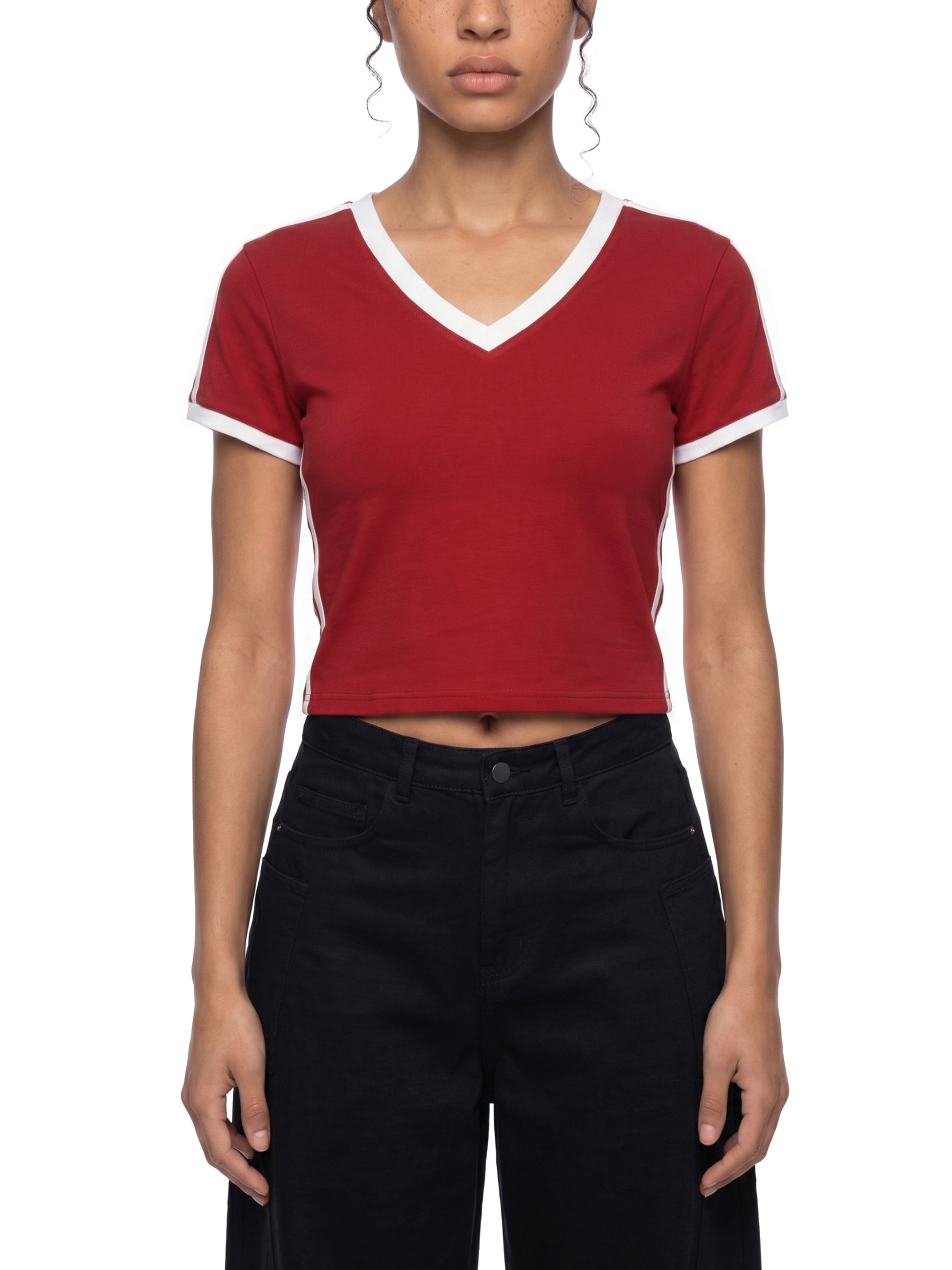 Red crop top with white trim worn by a person on a white background
