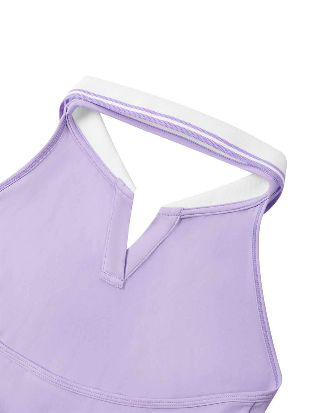 Close-up of a lavender sports bra with white trim on a white background