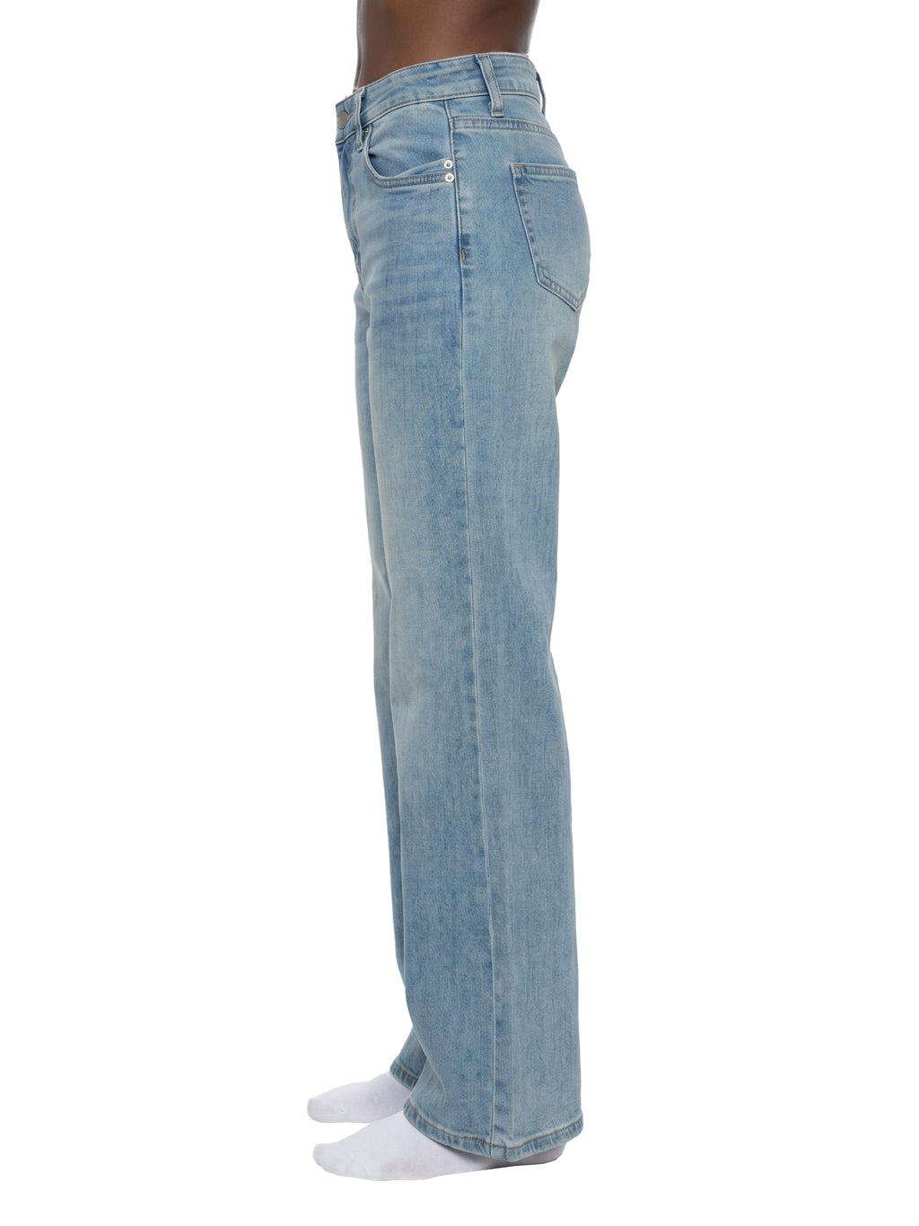 Light blue jeans worn by a person on a white background