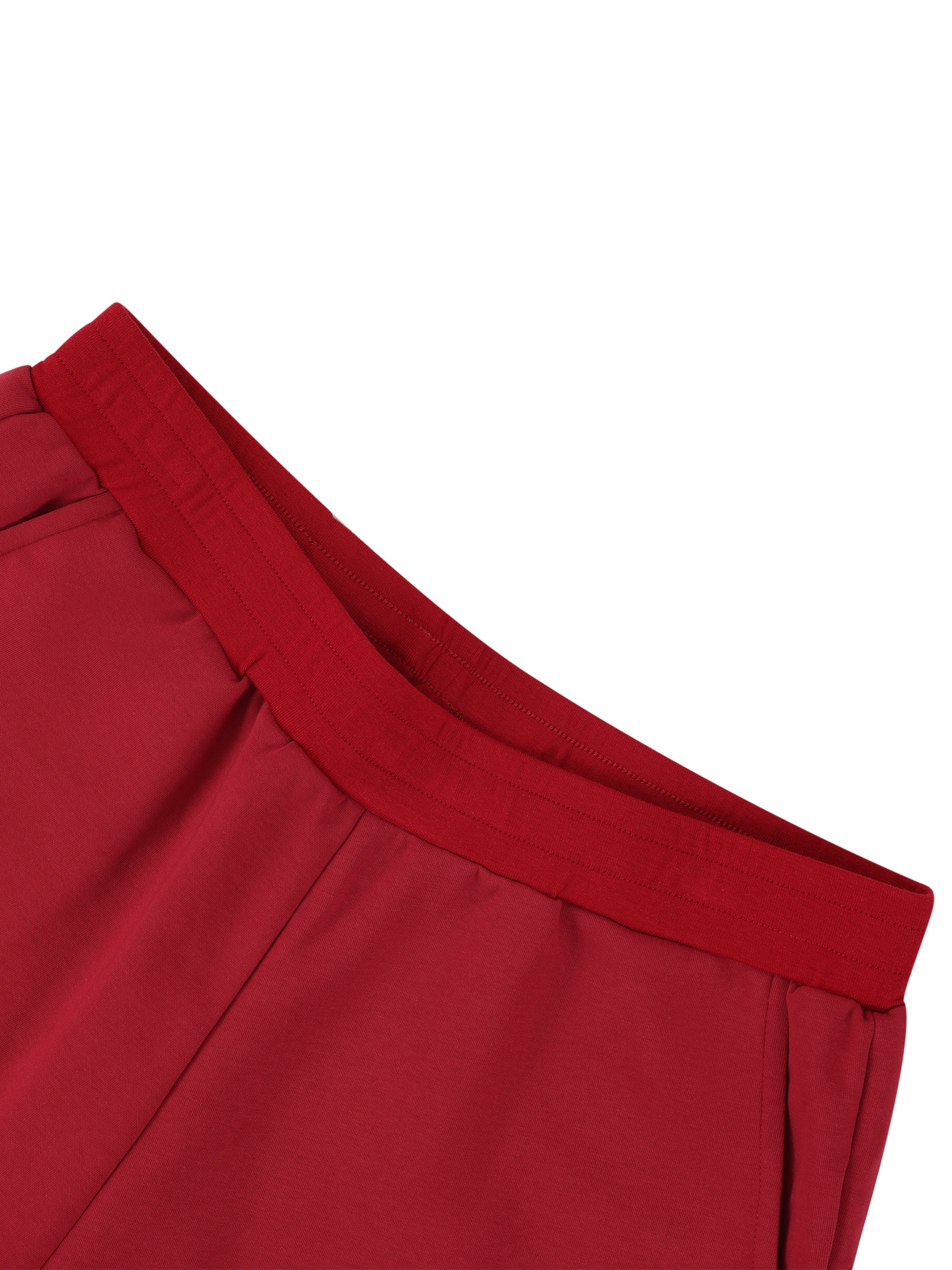 Close-up of a red garment with a white background