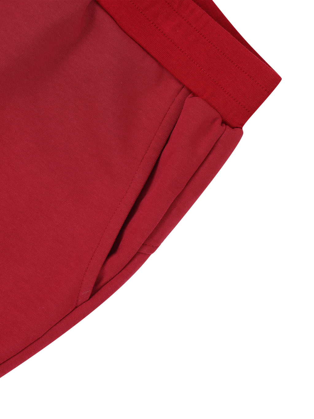 Close-up of red pants on a white background
