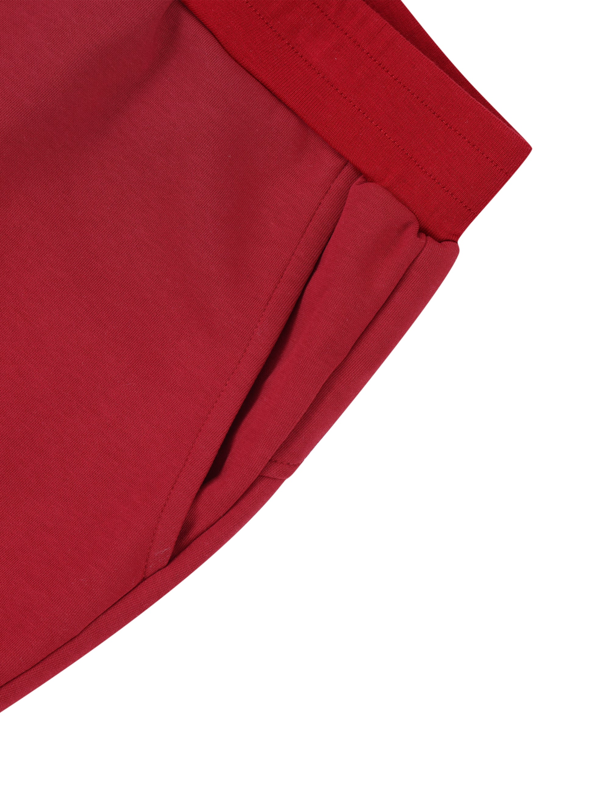 Close-up of red pants on a white background