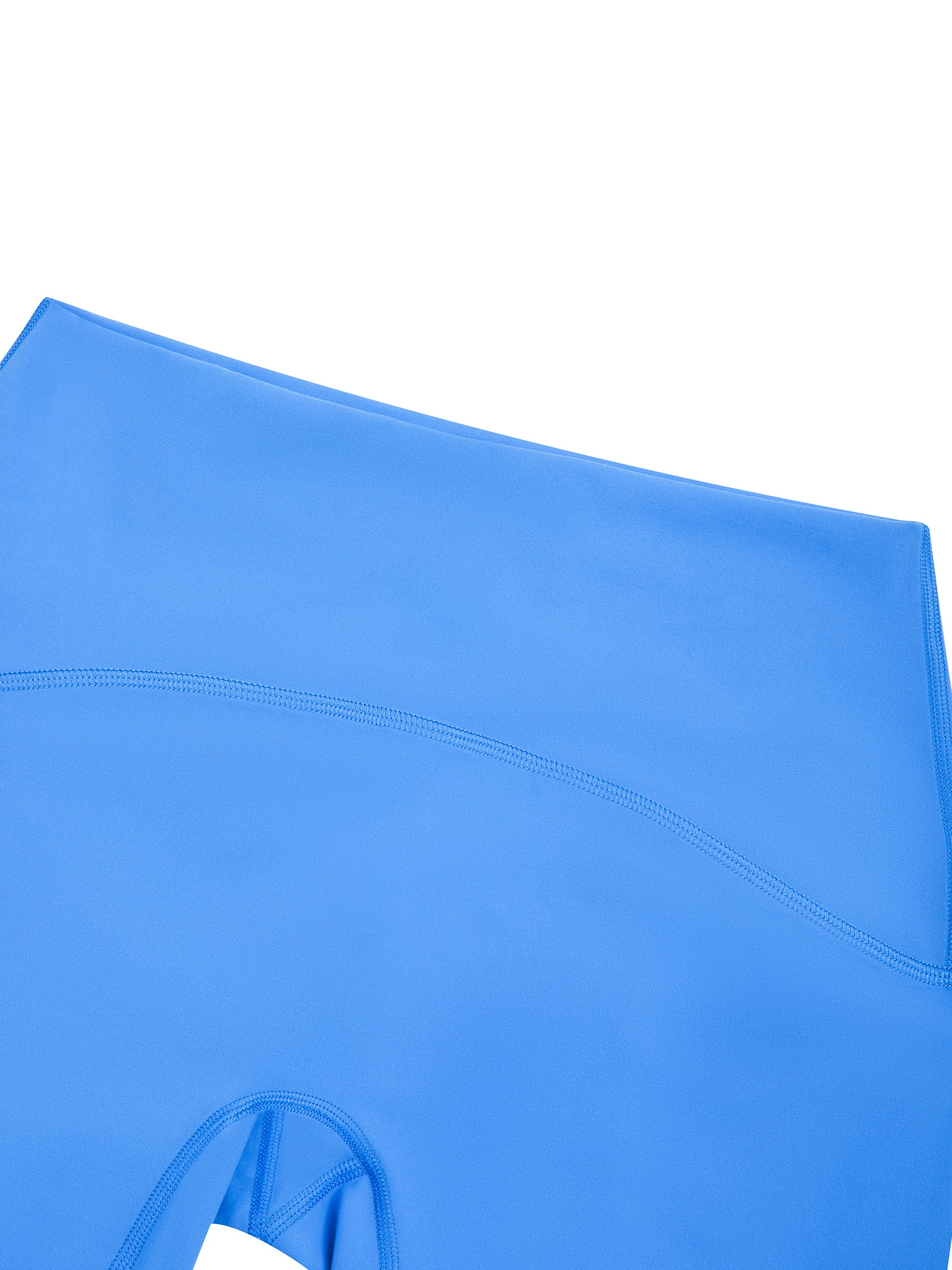 Close-up of a blue fabric with a subtle pattern on a white background