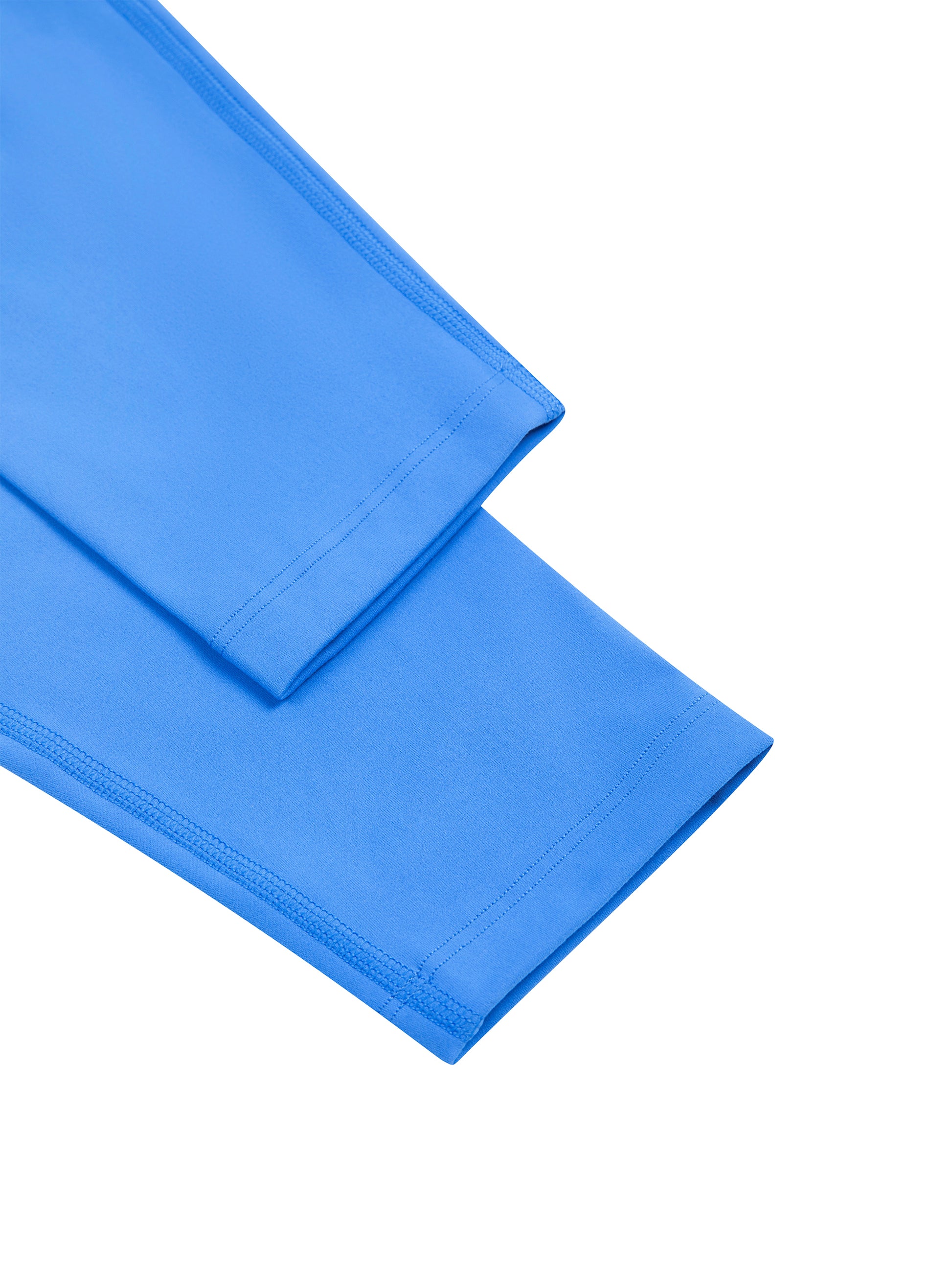 Two blue folded towels on a white background