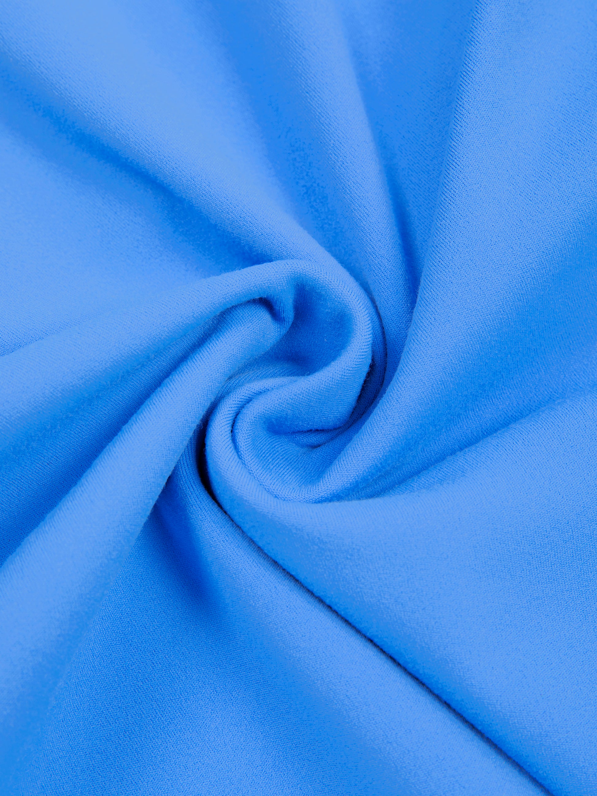 Close-up of blue fabric with folds