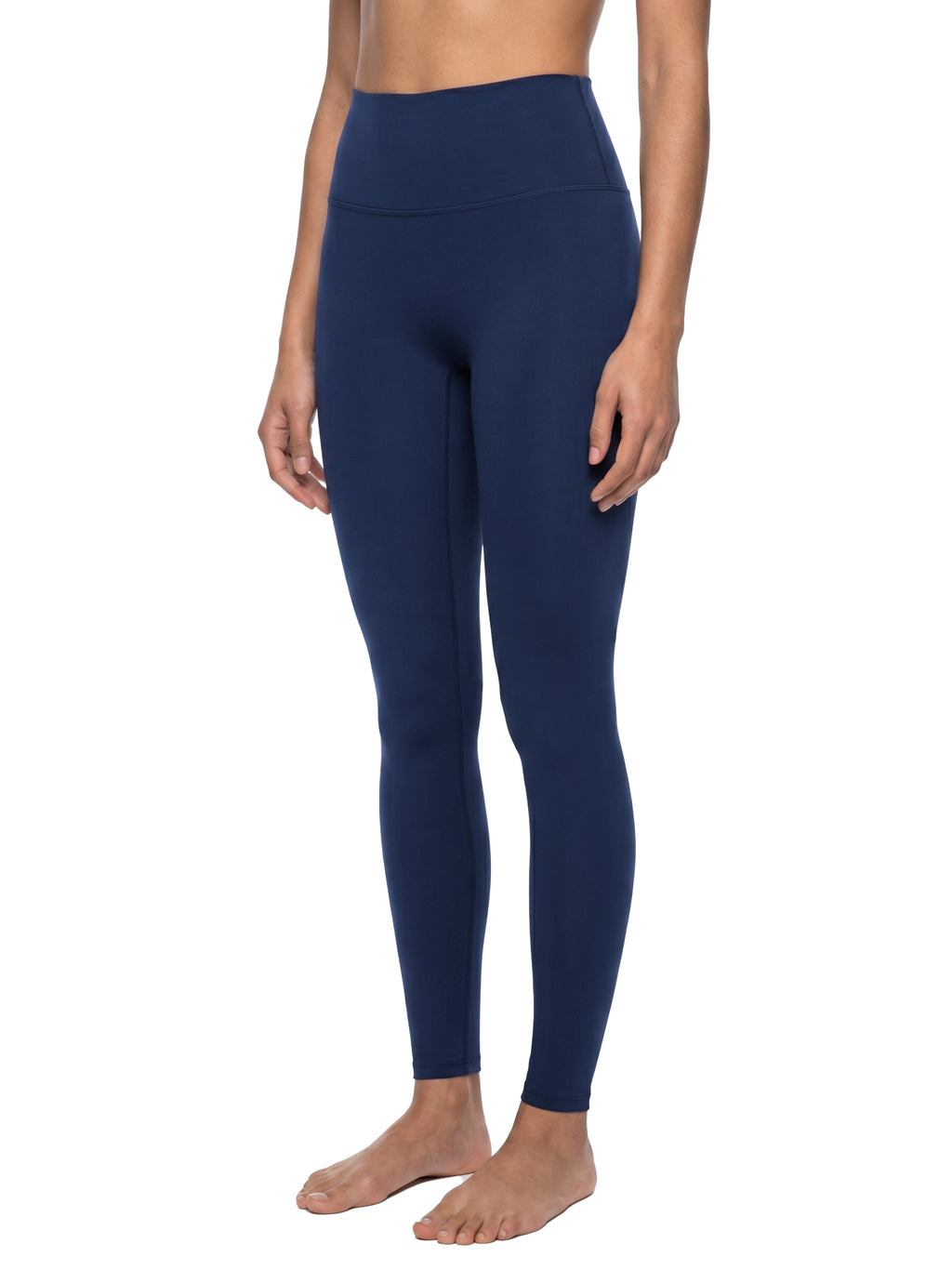 Navy blue leggings worn by a person on a white background