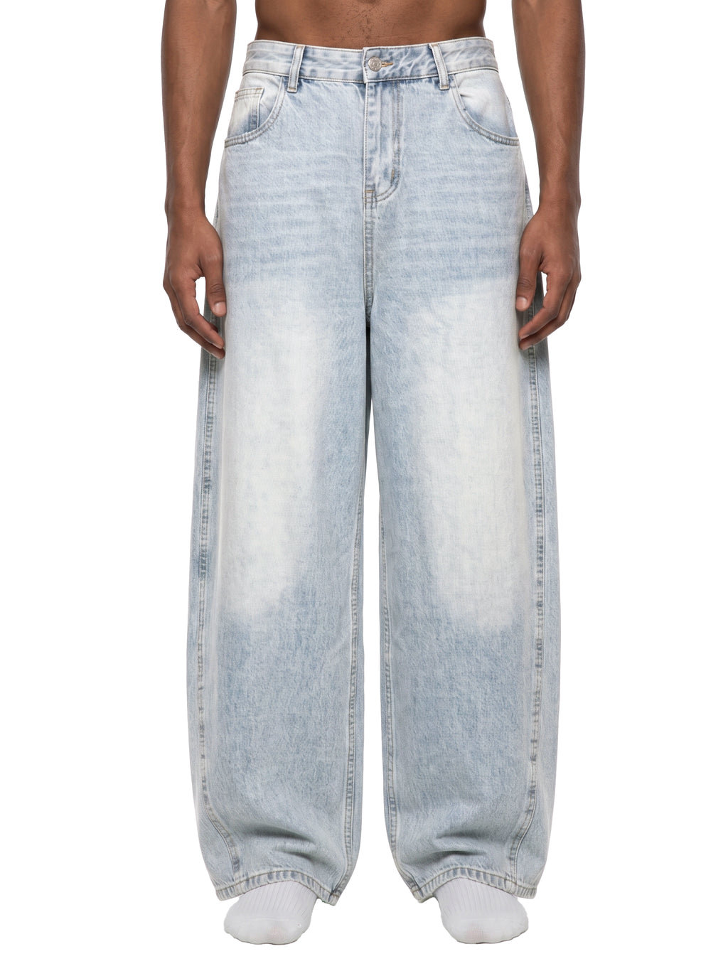 Light blue jeans worn by a person on a white background