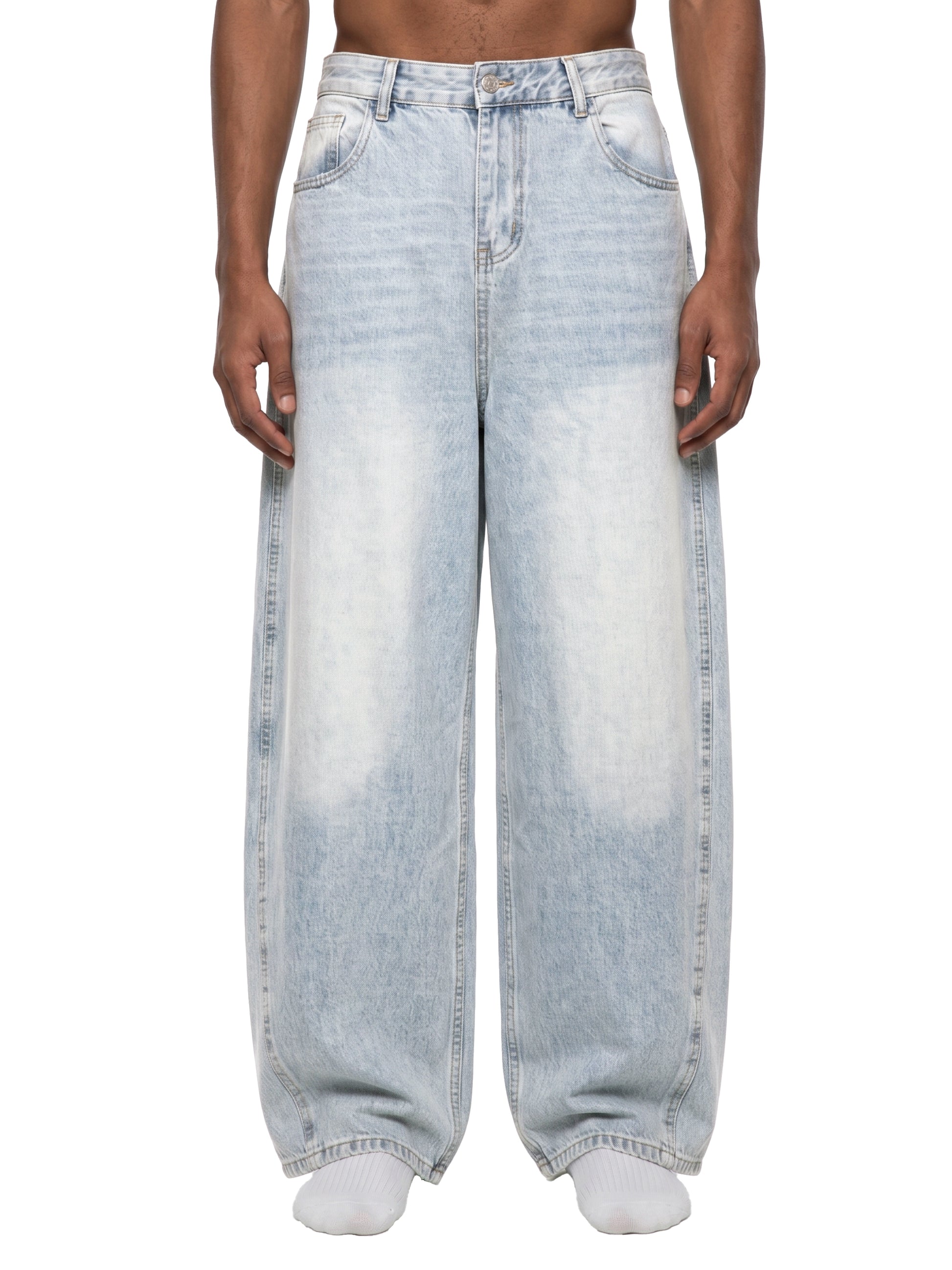 Light blue jeans worn by a person on a white background
