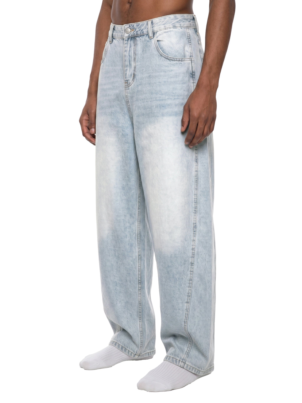Light blue jeans worn by a person on a white background