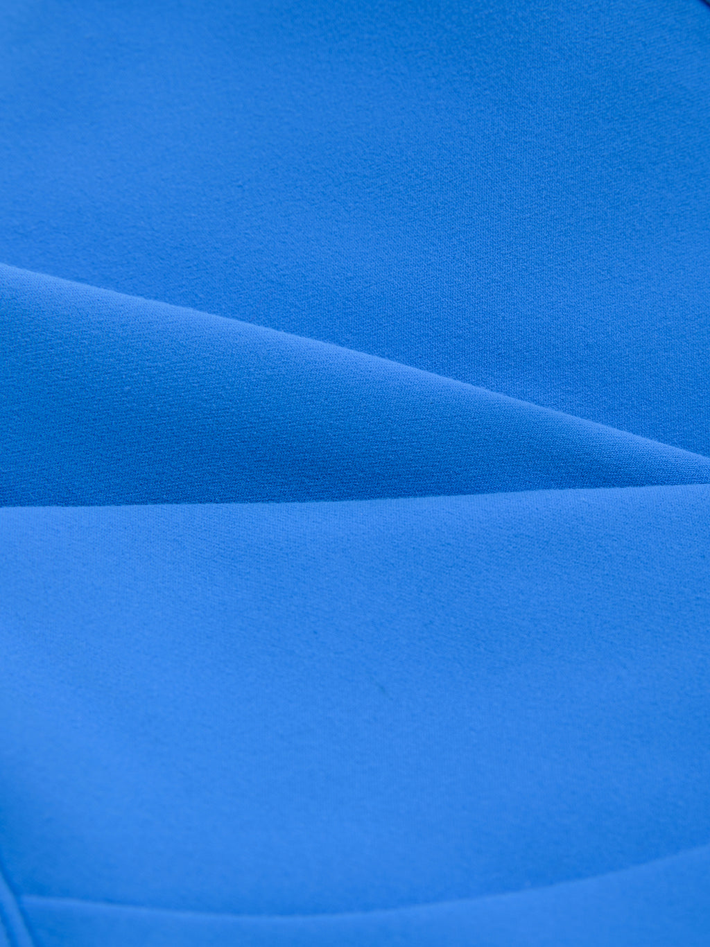 Close-up of blue fabric with folds