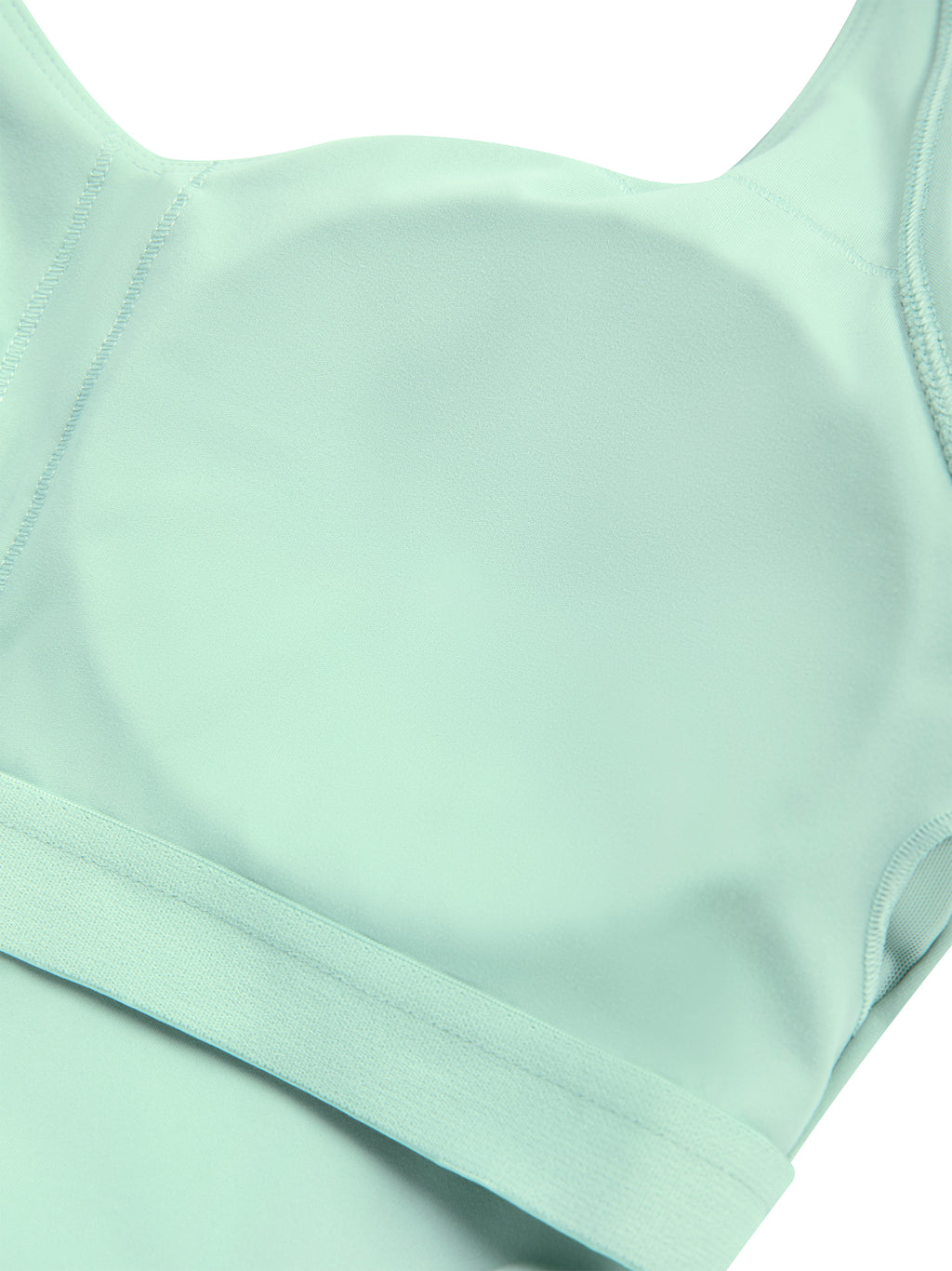 Light green bralette on a white background